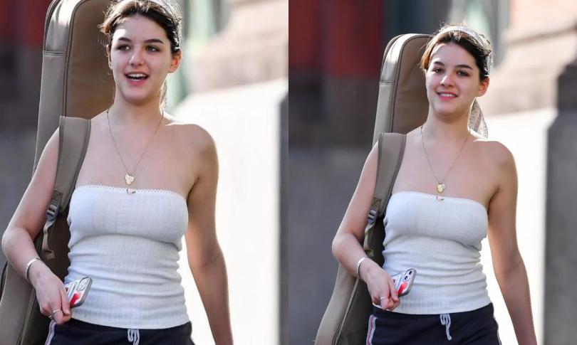 Сури Круз с гитарой на улицах Нью-Йорка