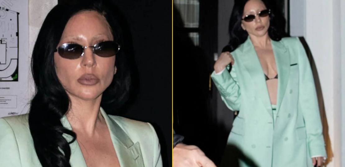 Преображённая Леди Гага в деловом костюме щеголяет бюстгальтером на улицах Парижа